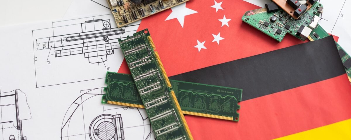 An advanced CPU printed with a national flag of Germany on a neon glowing electronic circuit board