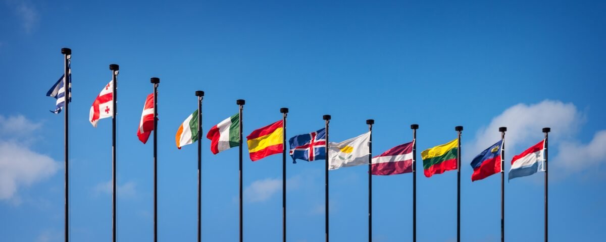 National flags of the European countries against the blue sky
